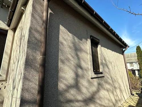 будинок за адресою Садова вул. 61-ая, 105