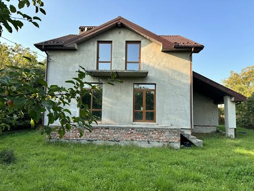 будинок за адресою с. Скнилів, Лесі Українки, 1