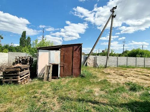 комерційна за адресою смт. Нова Водолага, Грушевського, 1